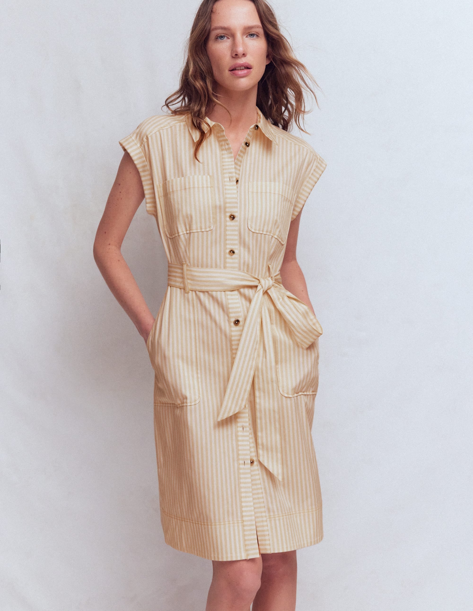 tan shirt dress The Best This beige maxi shirt dress features a sleeveless design with a structured collar and a full button BEIGE PRINTED SILK MIDI SHIRT