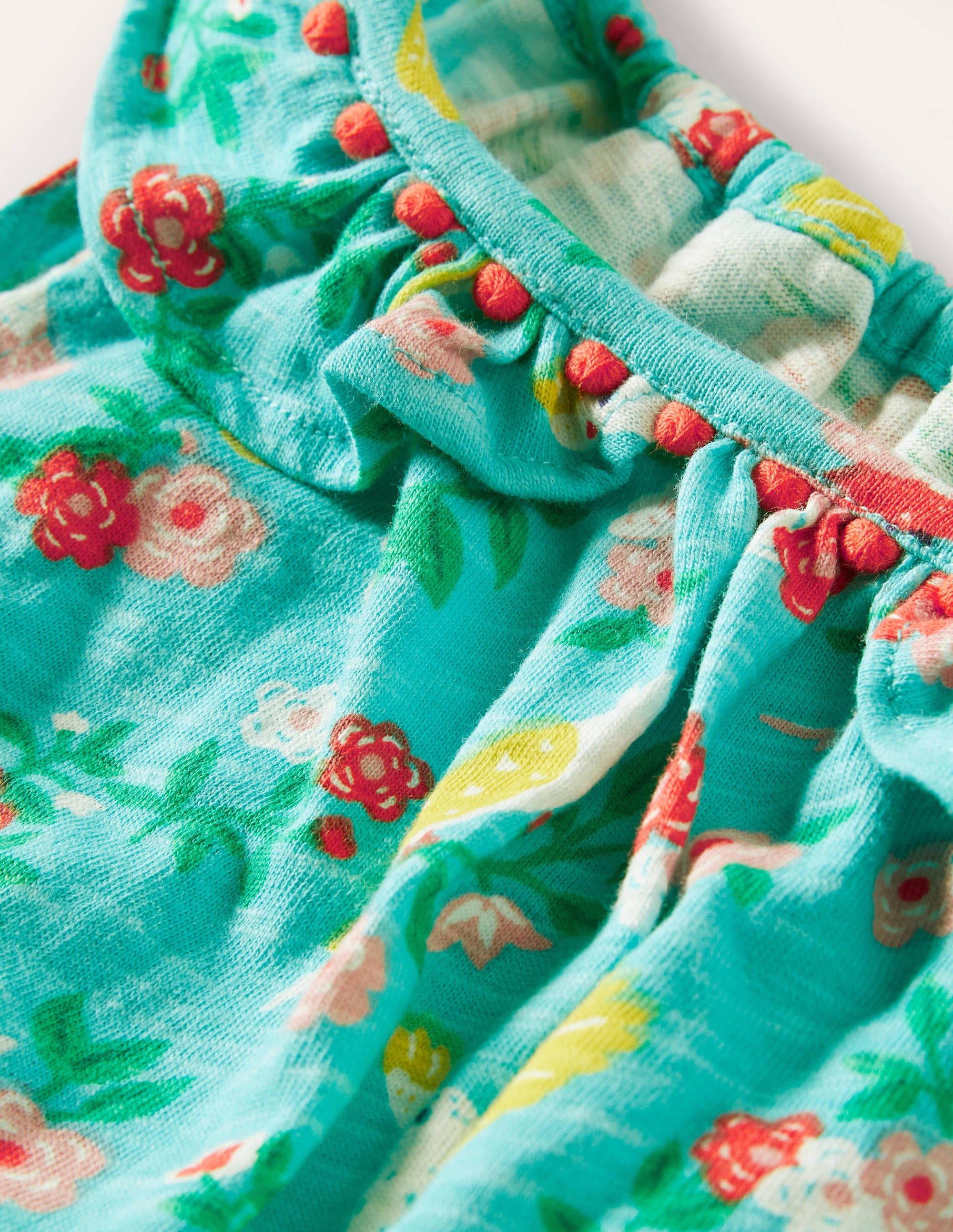 Charlie Pom Jersey Romper-Turquoise Tropical Garden - Image 3
