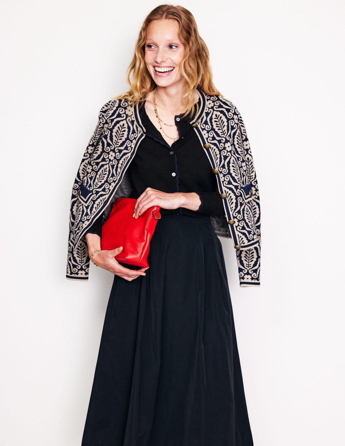 Boden Merino Scalloped Cardigan in black, on-model front view