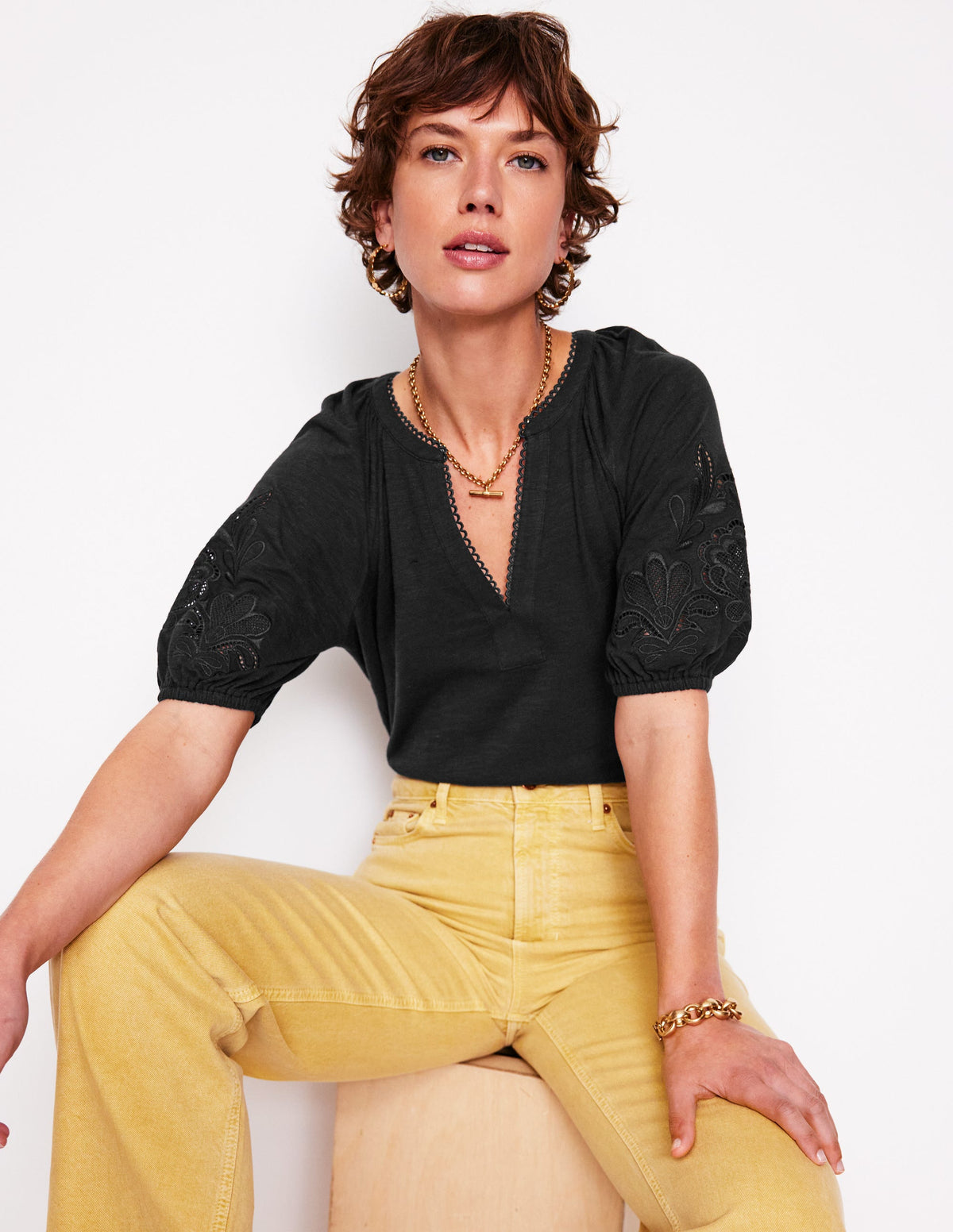 Cutwork Notch Neck Top-Black - Image 1
