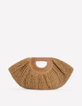 Brown woven handbag with a leather handle on a white background
