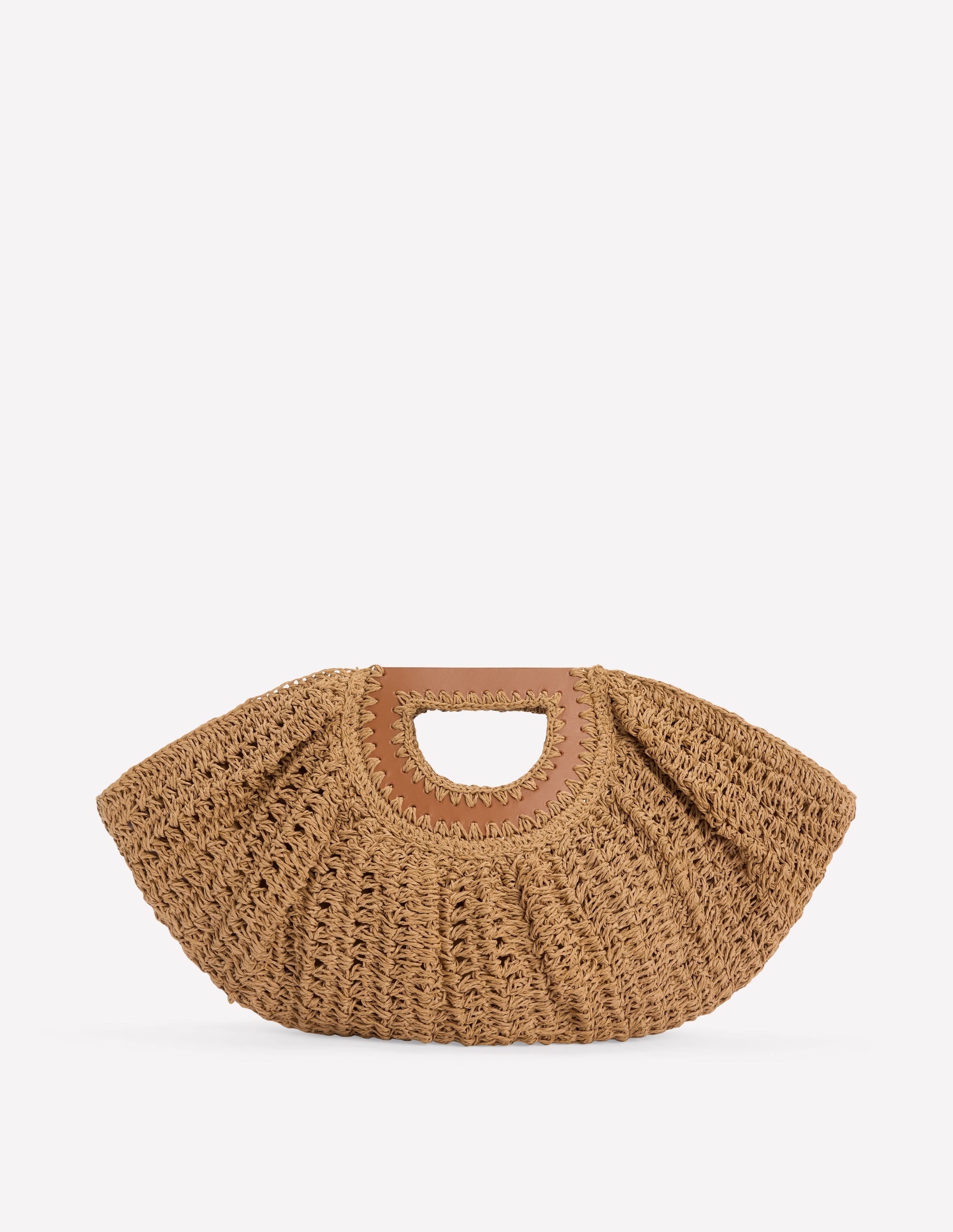 Brown woven handbag with a leather handle on a white background