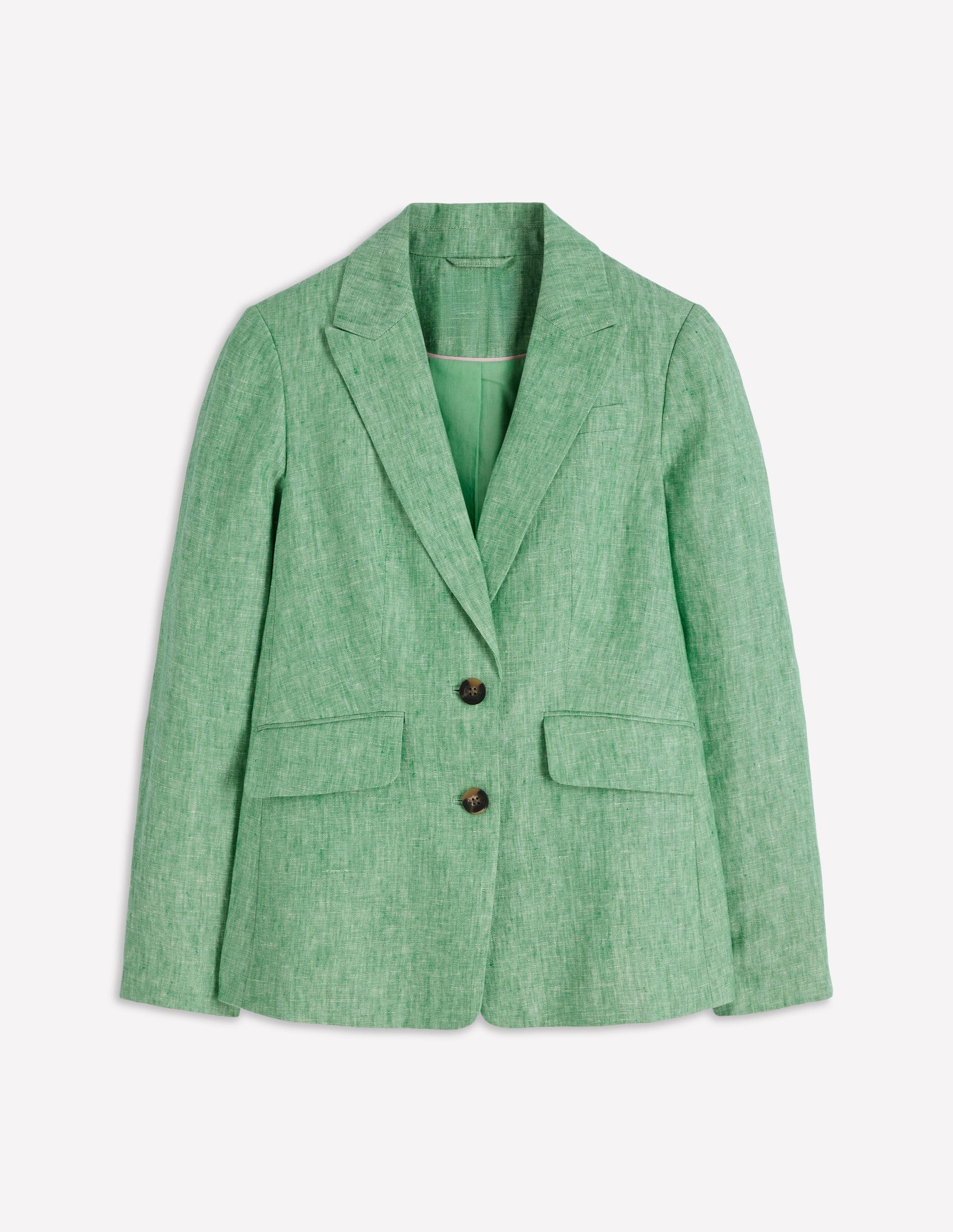 Green blazer on a light gray background