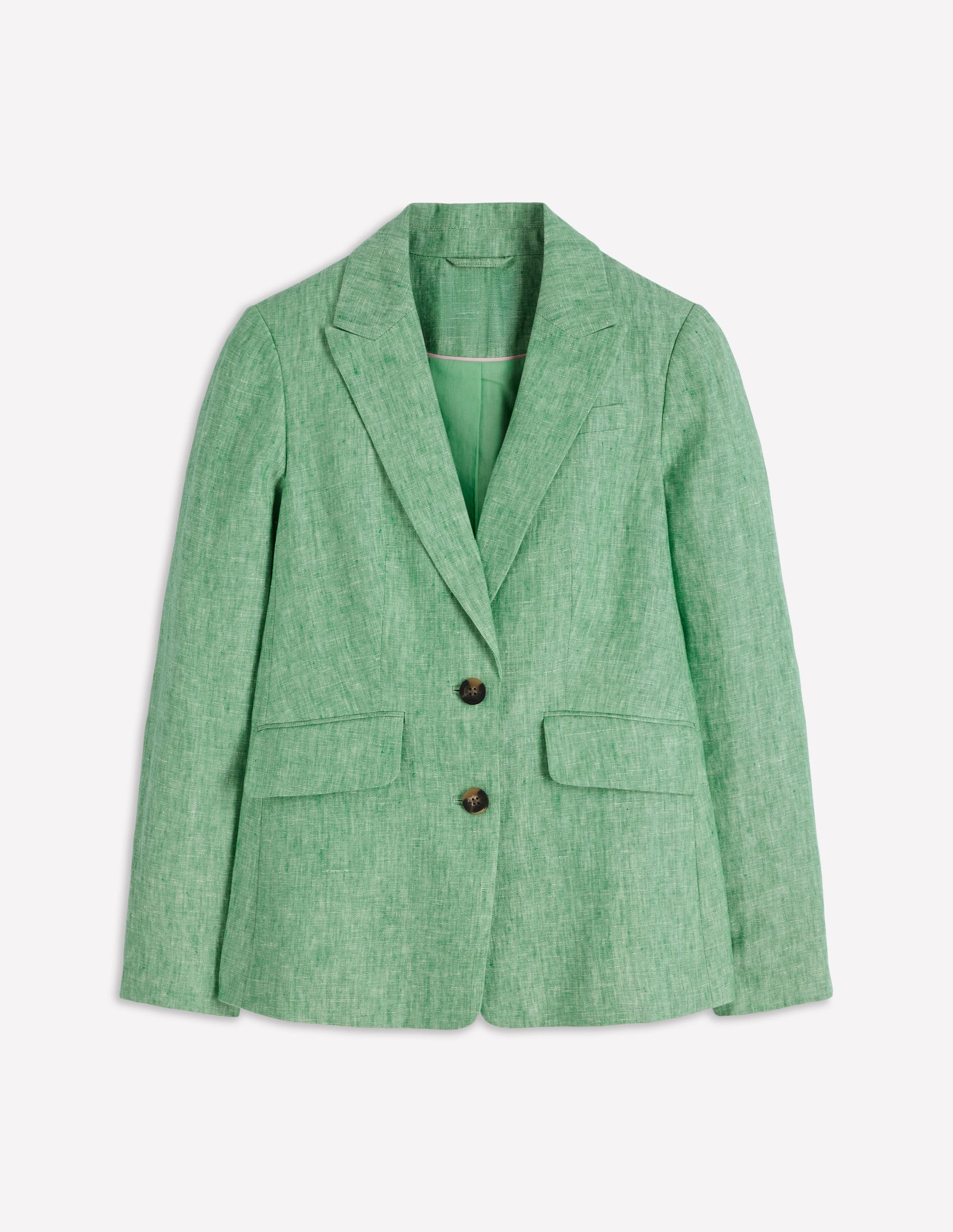 Green blazer on a light gray background