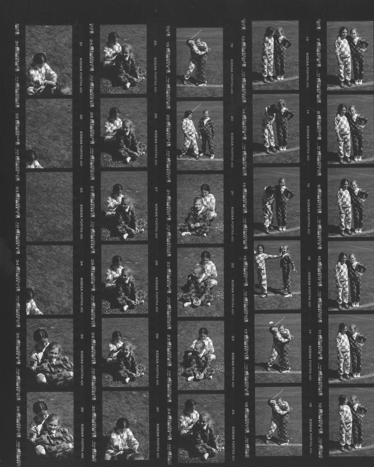 Contact sheet of black and white photos showing a person sitting on grass with a dog.