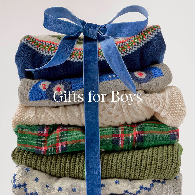 Stack of colorful boys' socks with a blue ribbon and text 'Gifts for Boys' on a light background.
