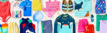 Colourful children's clothes from Boden, folded to be packed for Summer Camp