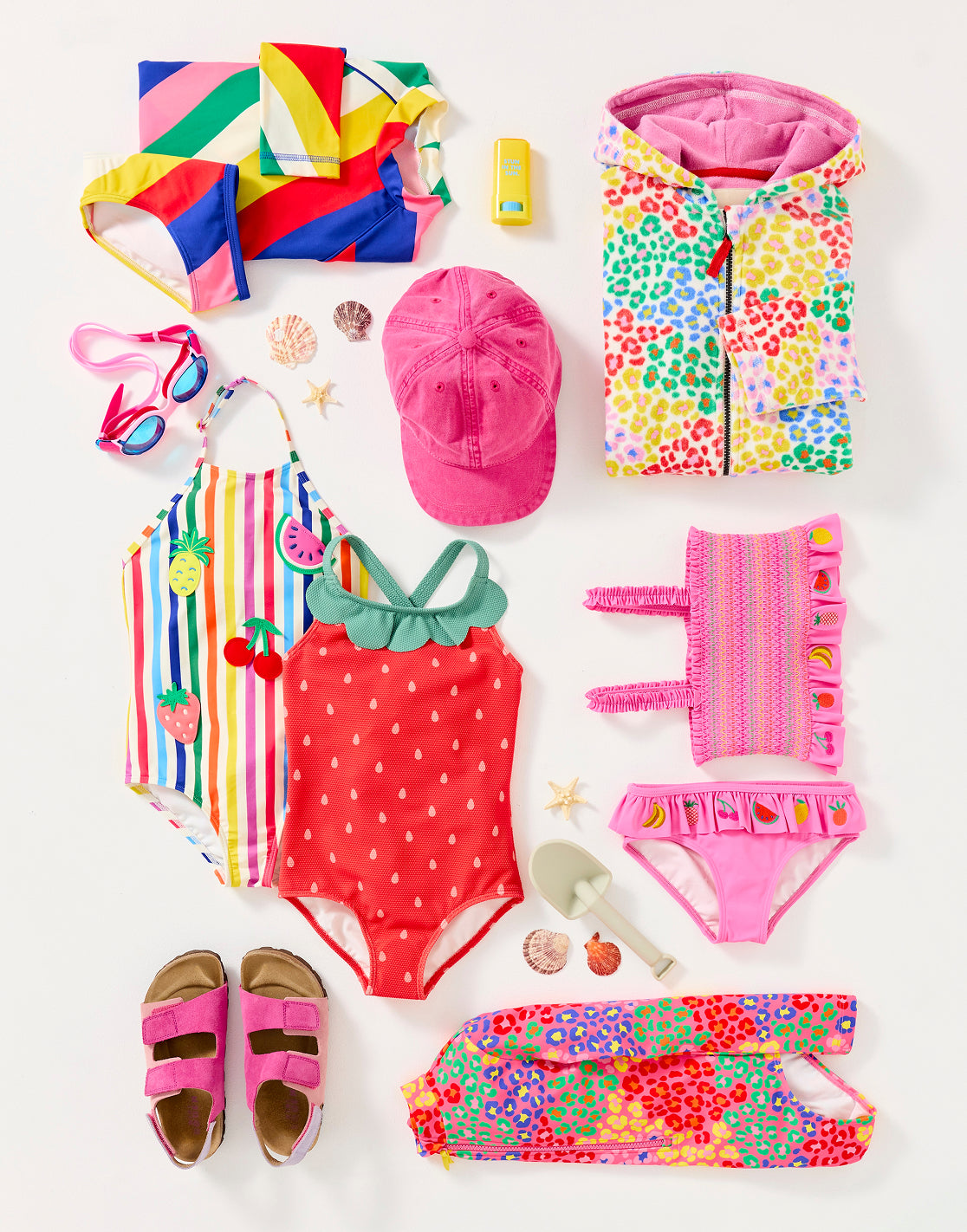 Colourful girl's Boden clothing, folded and ready to be packed for summer camp