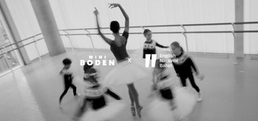 Dancers in a ballet studio with Mini Boden and English National Ballet logos.