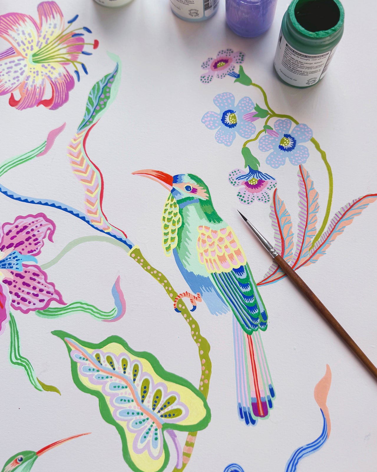 Colorful bird and floral illustration with paint cans and a brush on a white background