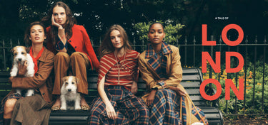 Four women seated on a bench outdoors with two small dogs, wearing coordinated fashion looks in earthy tones, with large red text reading 'A TALE OF LONDON' on the right side.