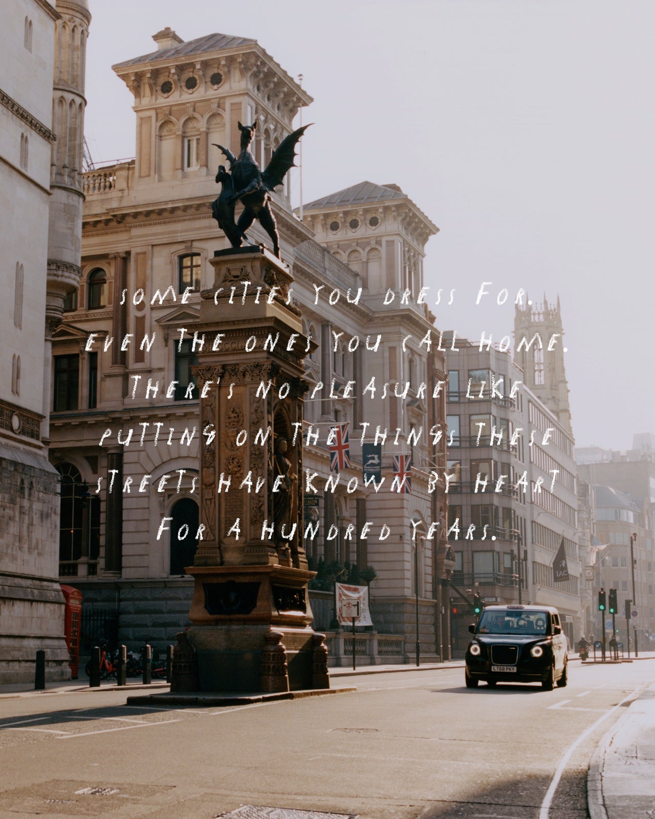 A scenic photograph of a London street with historic buildings, a statue, a black cab, and overlaid white handwritten text about streets and things you call home.