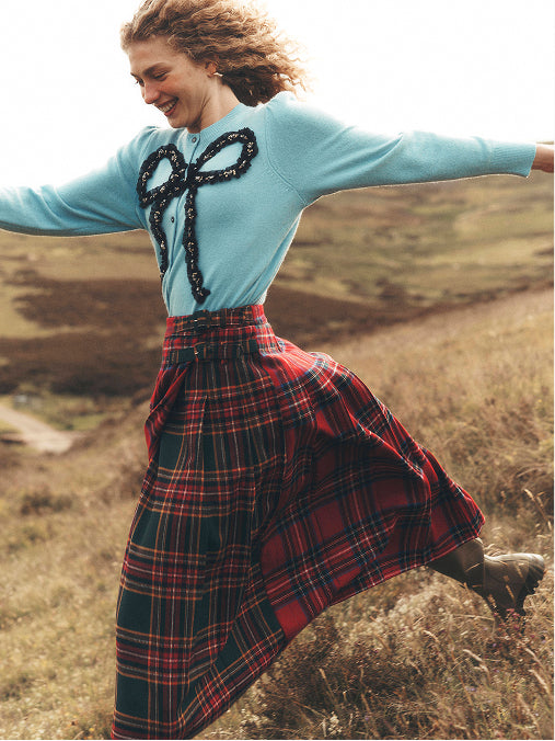 Women wearing a Tartan red shirt 