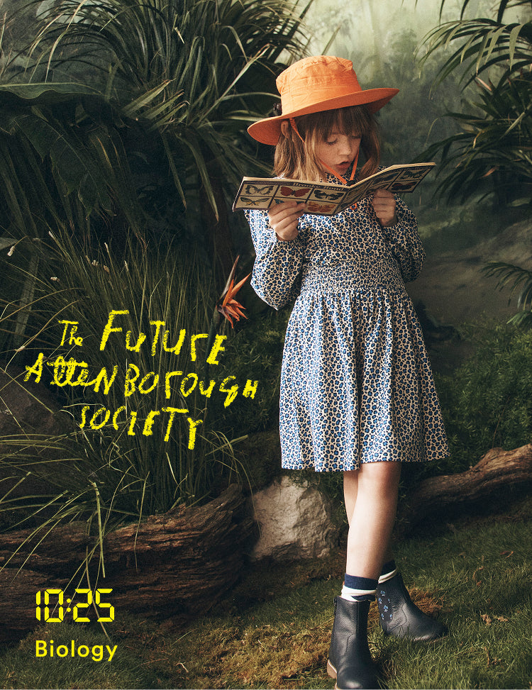 Person in a dress and hat reading a book in a forest setting with text overlay.