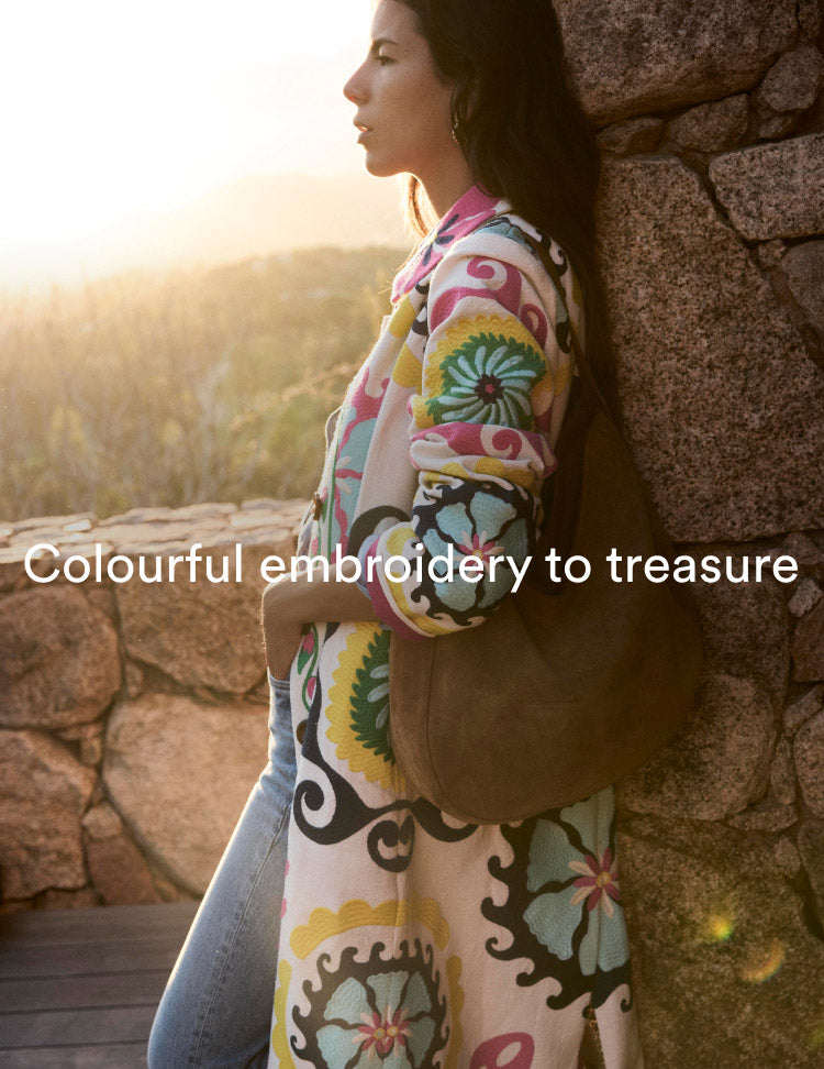 Caption "Colourful embroidery to treasure", linking to Embroidered Souvenir Coat - Multi Ornamental Wave