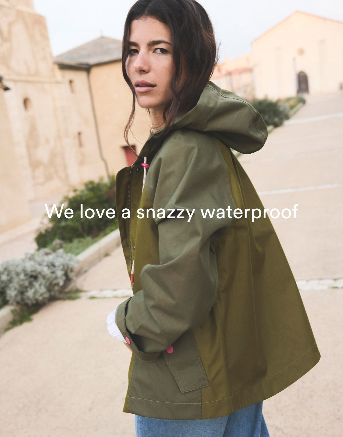 Caption "We love a snazzy waterproof", linking to Boden Cropped Raincoat - Khaki