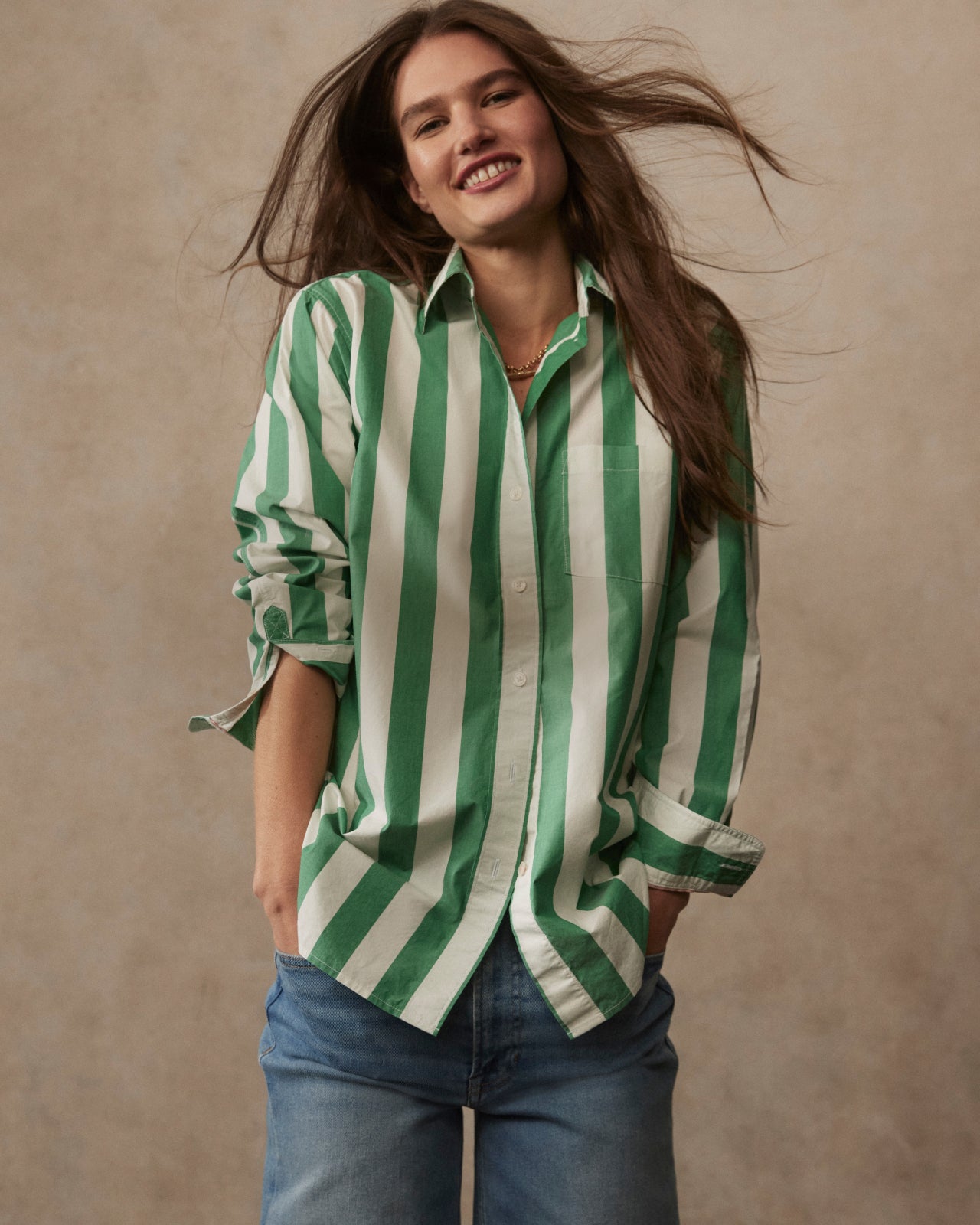 Woman posing in striped Sadie shirt. Image links to womens shirts.